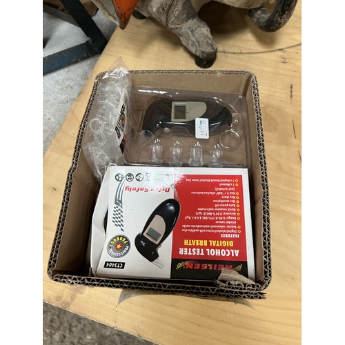 77 - Alcohol breath tester h109