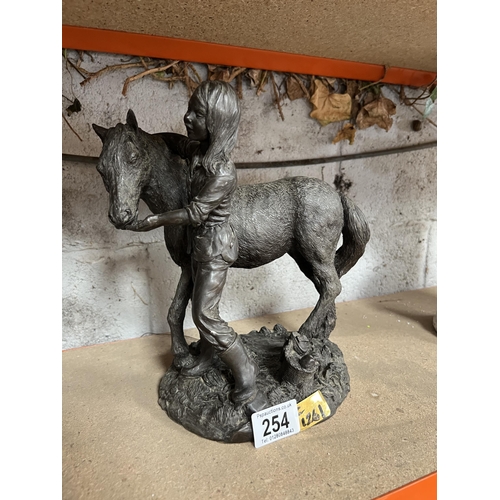 254 - Girl with horse ornament