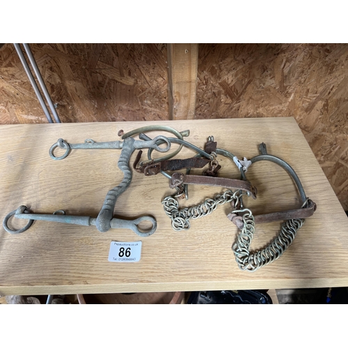 86 - pair boot spurs & horse bit