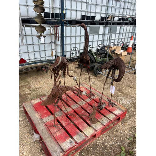 7 - pallet of metal bird ornaments