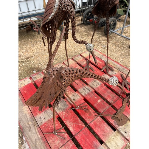 7 - pallet of metal bird ornaments