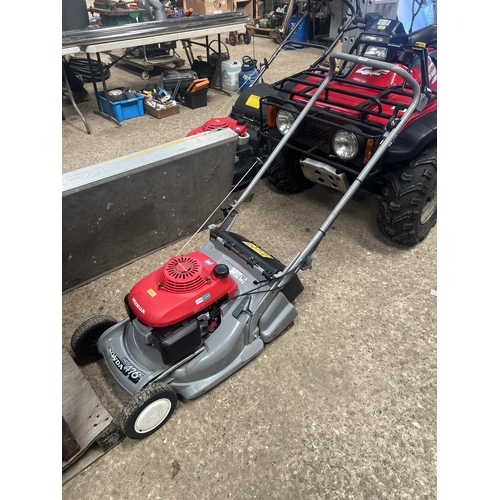 231 - 2002 Honda rotary mower. starts, runs, blade working, no roller drive, roller and transmission worn.... 