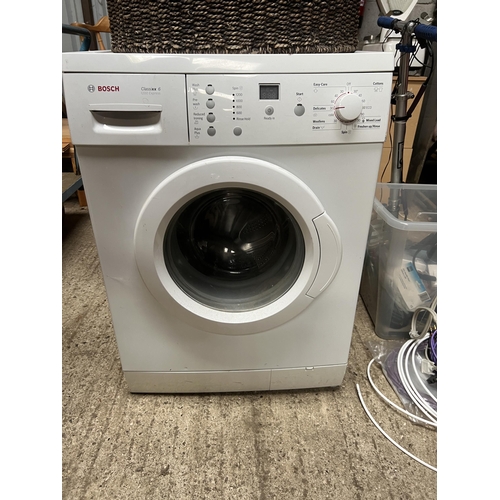 419 - Bosch washing machine+ laundry basket