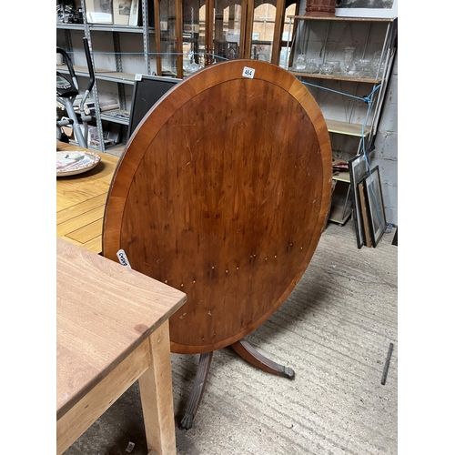 464 - oval tilt top table