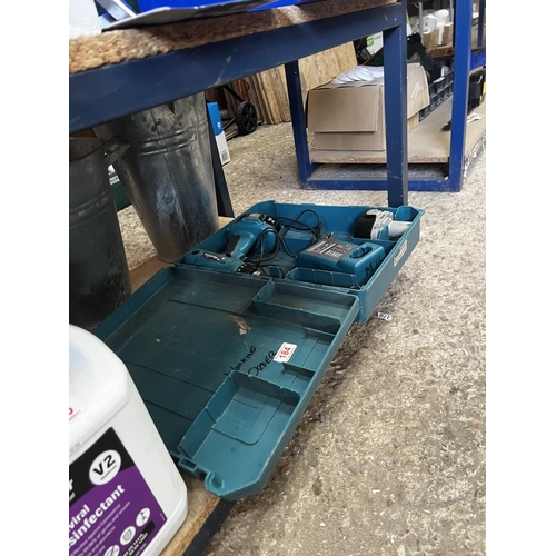 184 - cased makita drill