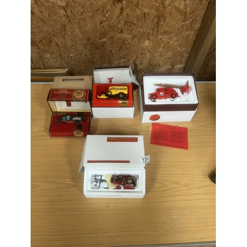 121 - 4 boxed vehicles