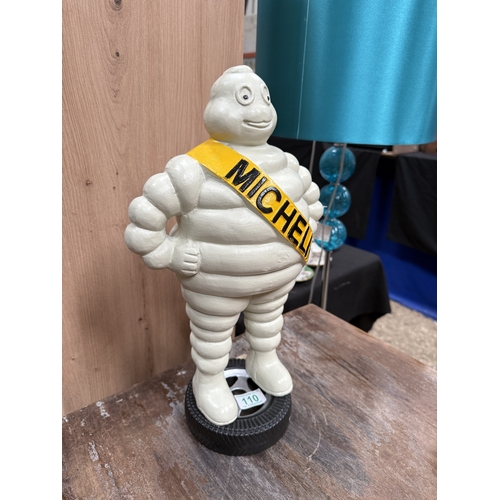 110 - metal Mitchell man standing on a Tyre   46cm high