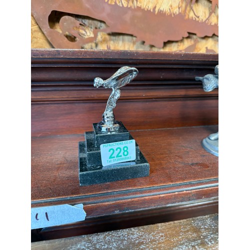 228 - spirit of ecstasy on granite