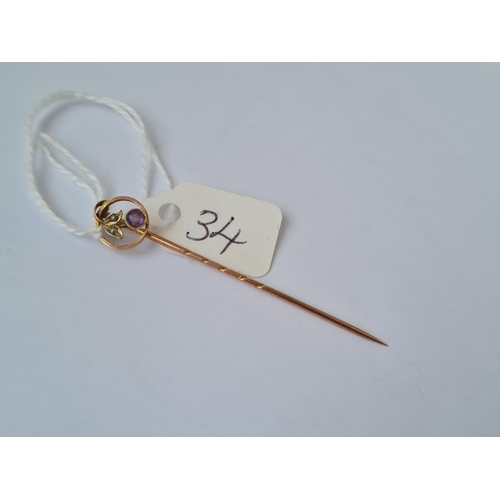 34 - Antique pearl & amethyst gold flower stick pin