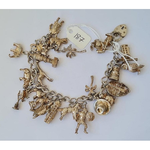 187 - A heavy silver charm bracelet 91g