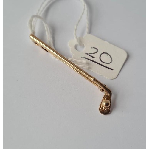 20 - A bar brooch in the form of a golf club in 9ct - 1.8gms