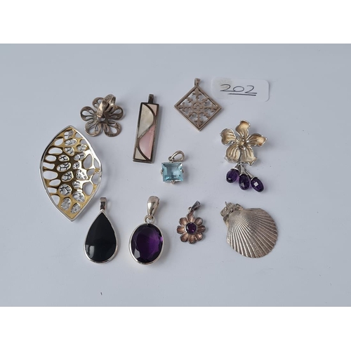 202 - Ten silver & stone set pendants