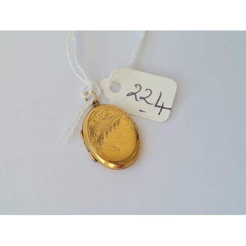 224 - 9ct back and front locket