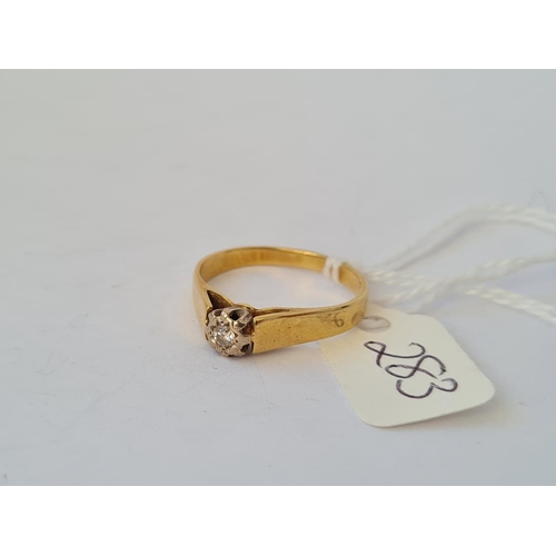 283 - A solitaire diamond ring in 18ct gold setting size O 3.7g