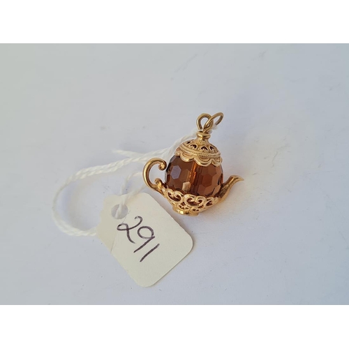 291 - A glass bodied 9ct teapot charm