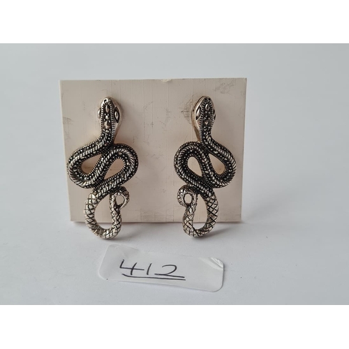412 - A pair of silver & marcasite snake earrings