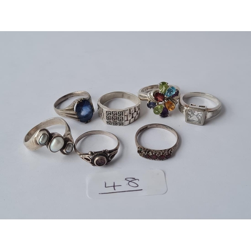 48 - Seven assorted silver gem set rings - 27.3gms