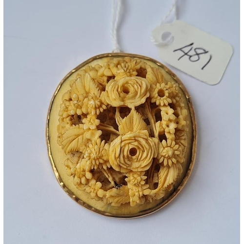 481 - Large carved bone floral pendant in gold mount