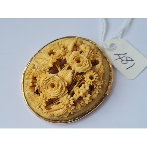 481 - Large carved bone floral pendant in gold mount