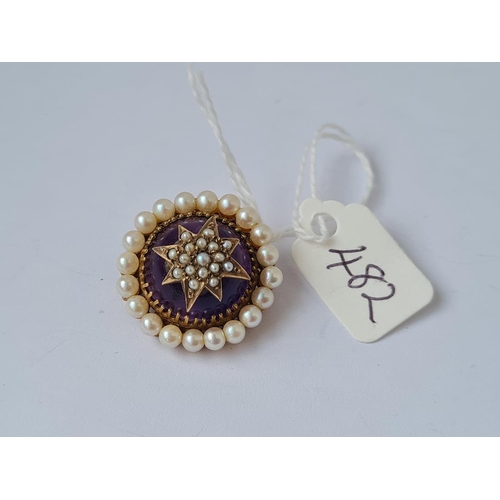 482 - An amethyst and pearl dome brooch mounted in gold 9g inc
