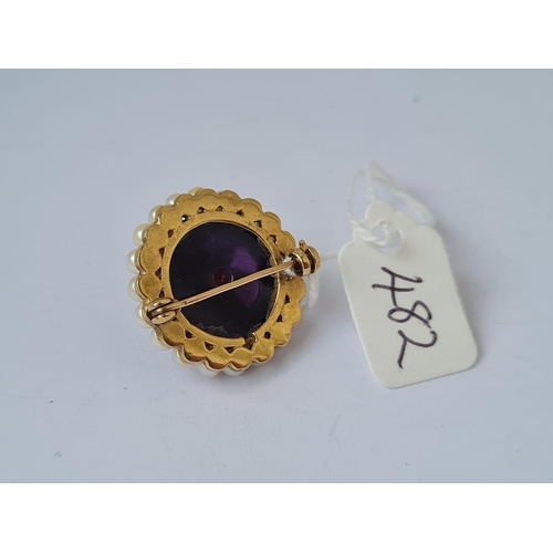 482 - An amethyst and pearl dome brooch mounted in gold 9g inc