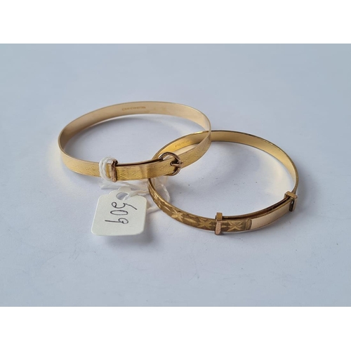 509 - Two vintage rolled gold buckle bangles