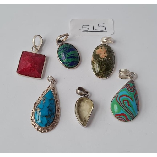 515 - Six silver mounted stone pendants