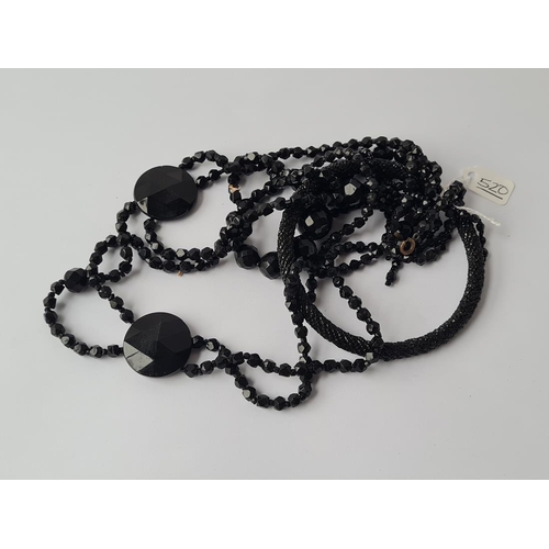 520 - Three pieces of jet jewellery