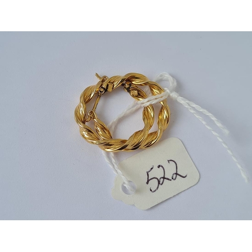 522 - A pair of 9ct twist earrings 1.8g