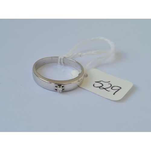 529 - A diamond set 18ct white gold wedding band size O 3g