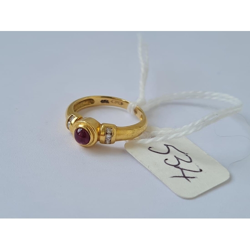 534 - A cabochon ruby ring with diamond shoulders in 18ct gold size I 3g