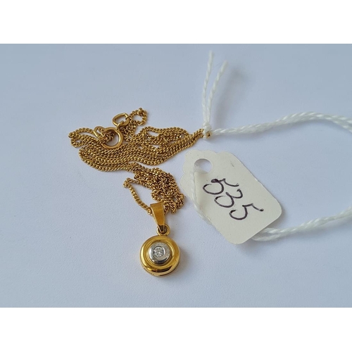 535 - A circular diamond set 18ct gold pendant on 18ct gold chain 3.5g