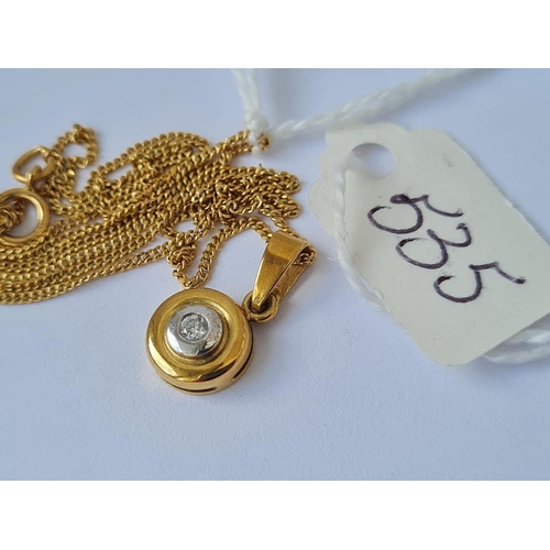 535 - A circular diamond set 18ct gold pendant on 18ct gold chain 3.5g