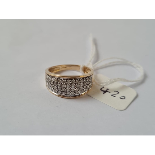420 - A multi diamond ring in 9ct - size M - 2.9gms