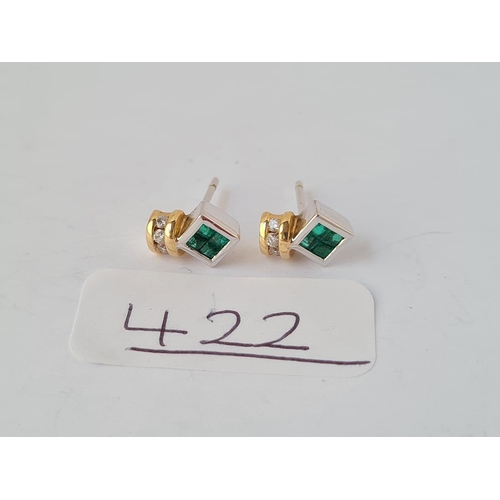 422 - A pair of diamond & emerald set earrings in 18ct gold