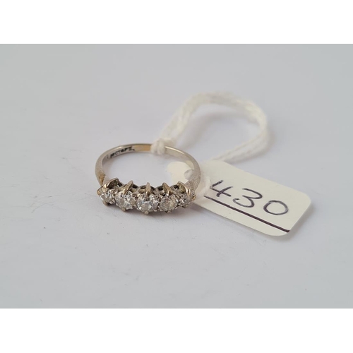 430 - A 5 stone diamond ring set in 18ct whitye gold - size I - 2gms