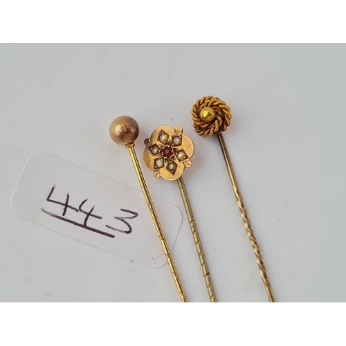 443 - Three antique stick pins in 9ct - 3.4gms