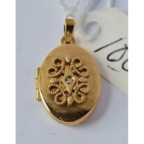 100 - A fancy 9ct locket set with a single diamond ro centre 2.2g inc