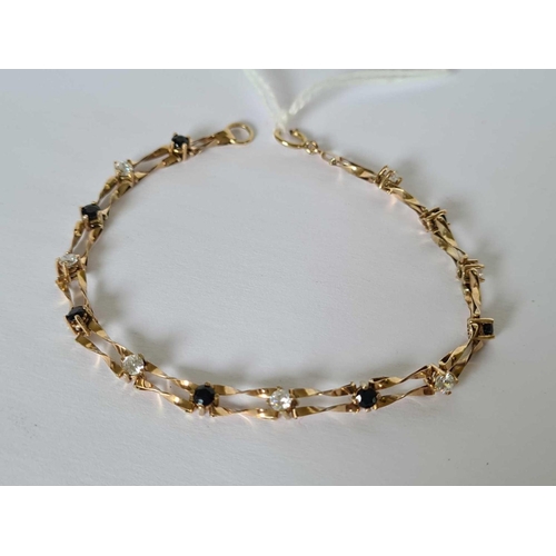 110 - A stone set bracelet 9ct - 4 gms
