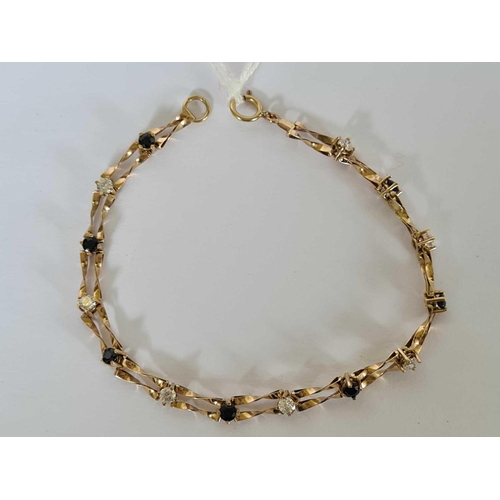 110 - A stone set bracelet 9ct - 4 gms