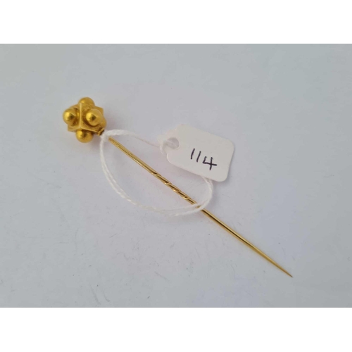 114 - A unusual antique Victorian stick pin designed as a cube with added hemispheres 15 ct gold