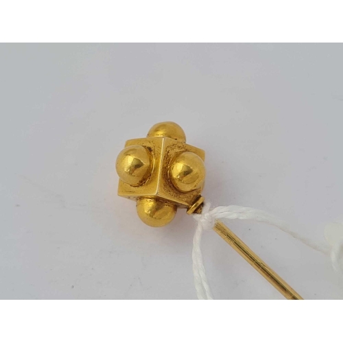 114 - A unusual antique Victorian stick pin designed as a cube with added hemispheres 15 ct gold