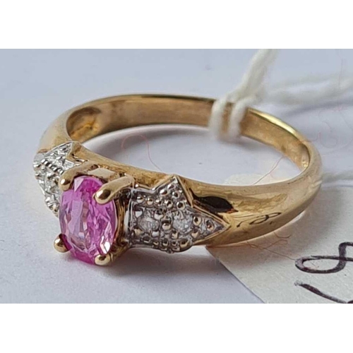89 - A pink sapphire ring set with diamond shoulders size N 2.3g inc