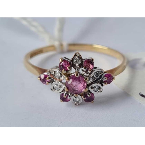 91 - A ruby and diamond cluster ring in 9ct size M