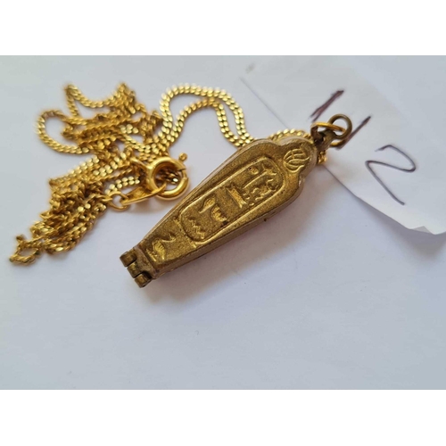 112 - Novelty metal Sarcophagus opening pendant necklace containing  mummy