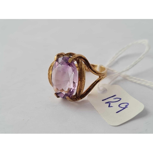 129 - A large oval single stone amethyst ring 9ct size M1/2 - 5.1 gms