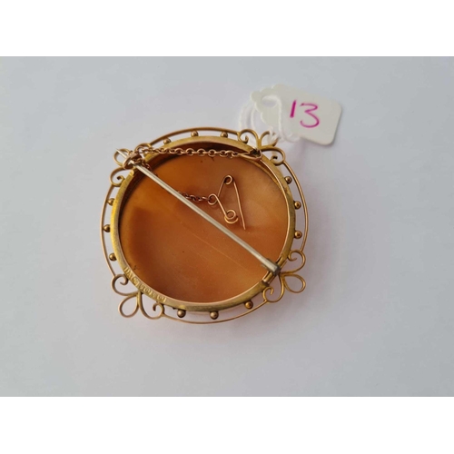 13 - A circular gold mounted cameo brooch