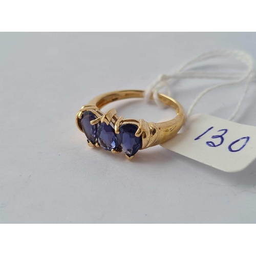 130 - A three stone pear shaped tanzanite band ring 9ct size N - 3.2 gms