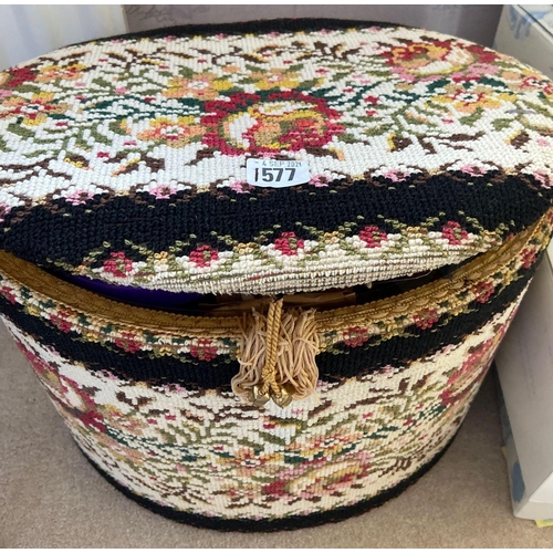 1577 - An oval tapestry work box with cotton reels etc