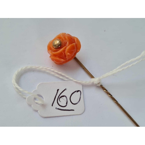 160 - A carved coral rose 9ct stick pin